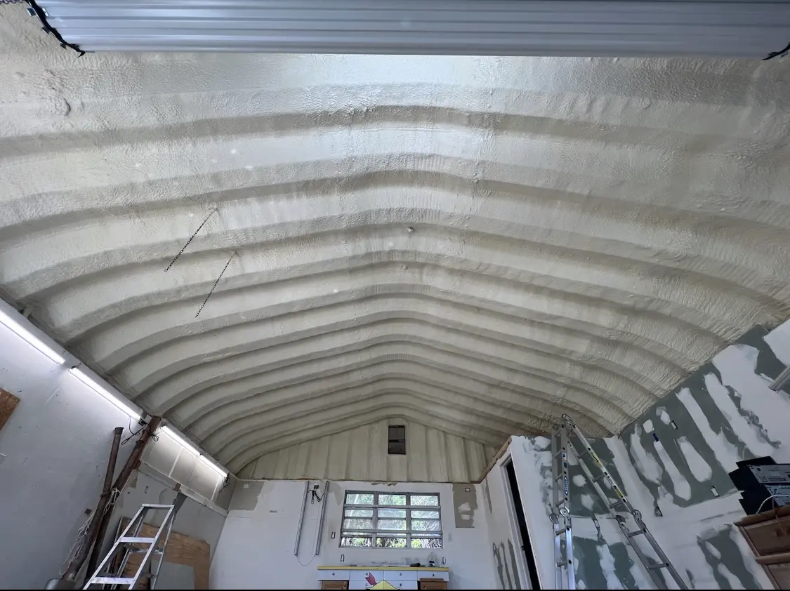 Spray polyurethane foam applied to the underside of a metal roof deck in Franklin Park